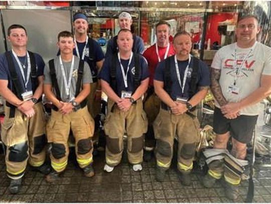 Along with his son, Elk City veteran firefighter makes the big climb: