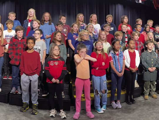 Sayre Elementary’s fourth graders practiced hard and performed their songs honoring America’s military with perfection