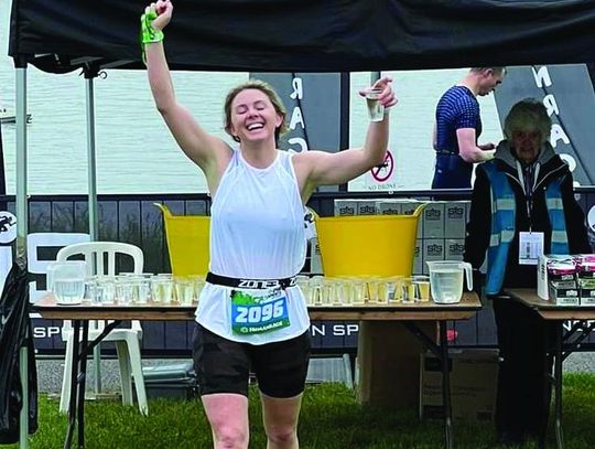 Sayre graduate accomplishes triathlon in England