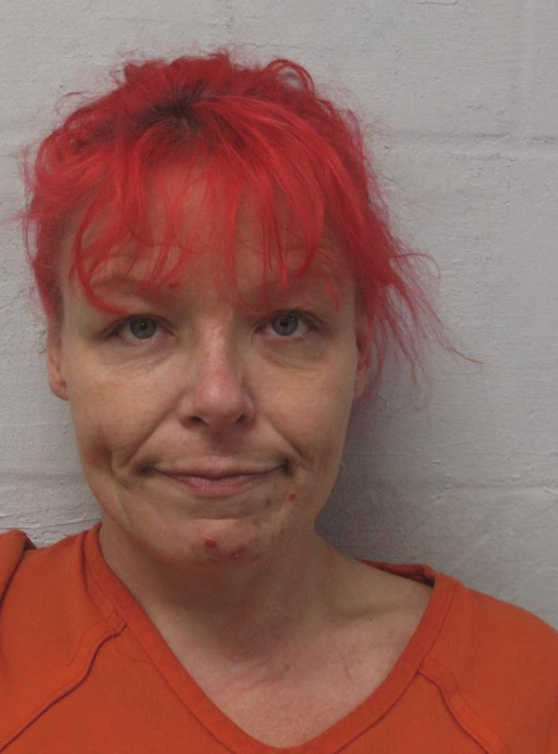 Elk City woman charged with first-degree arson of abusiness