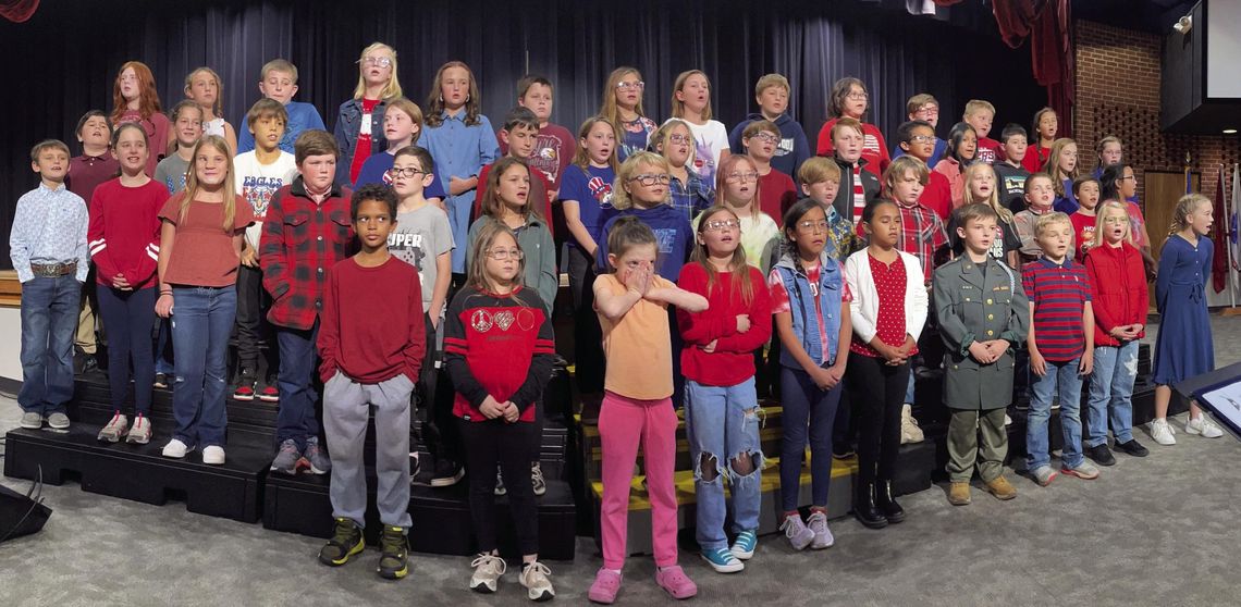 Sayre Elementary’s fourth graders practiced hard and performed their songs honoring America’s military with perfection