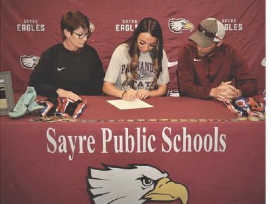 Josie Merrick signed her letter of intent to run track for OPSU. Staff photo by Heather Martin.