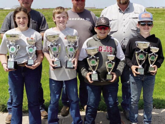 Champion Jr Team Katlynn Wood, Reed Tucker, Iceyn Gloria, Cooper Roberts plus their individual trophies