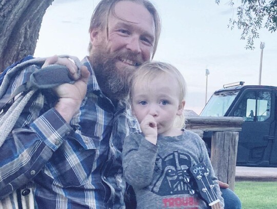 Artist Jessie Osborn and his son