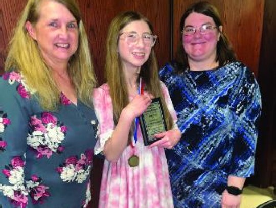 Pictured above from left to right: Coach Sheila Hunter, Abby Cox, and Coach Brenna Sweat. Abby received our Junior High MVP award.