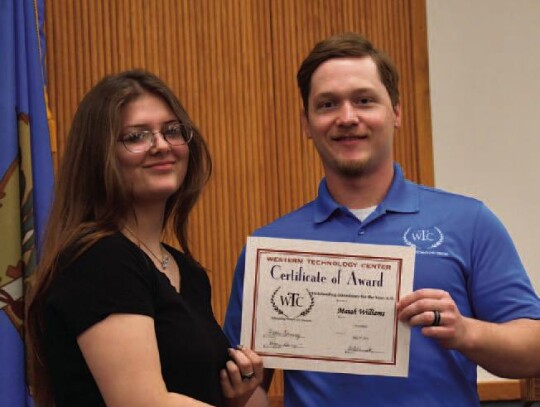 Maiah Williams, Elk City High School, and WTCSayre Welding student earned an Outstanding Attitude for the Year and Perfect Attendance for the Year Awards. Welding Instructor, Kelly Vanderwork is presenting Maiah her award.